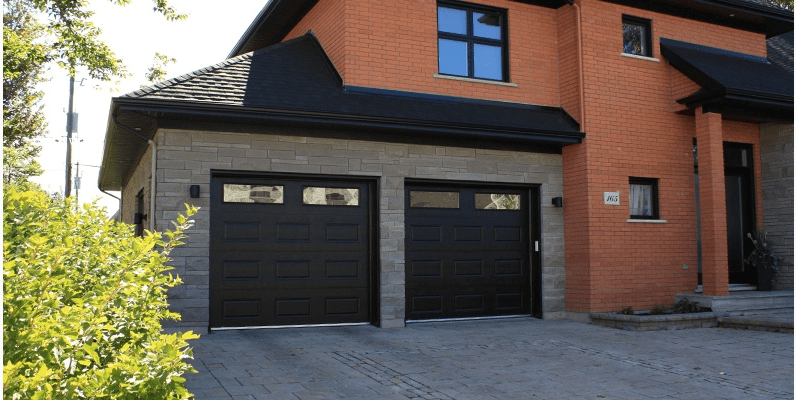 House with black garage doors