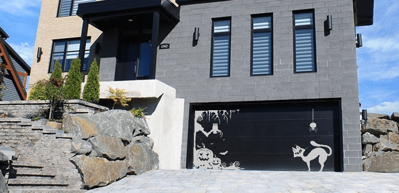 Residential garage door with Halloween decoration