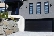 House with black garage door